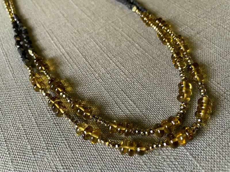 side view of gemstone bead necklace comprising whiskey quartz, dark bronze and golden pyrite