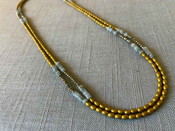 top view of gemstone bead necklace comprising labradorite, gold hematite and golden pyrite