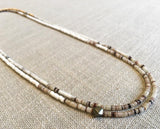 top view of gemstone bead necklace comprising white shell 