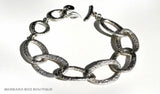 top view of organic-shaped silver bracelet