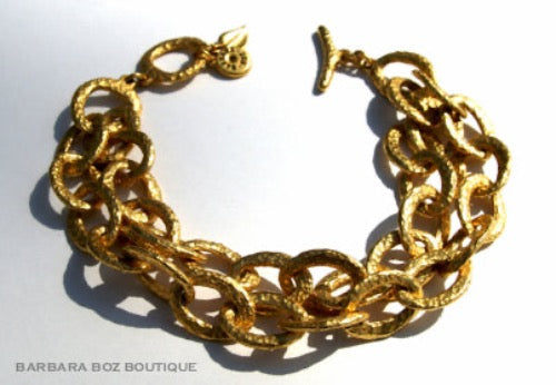 top view of organic-shaped gold bracelet