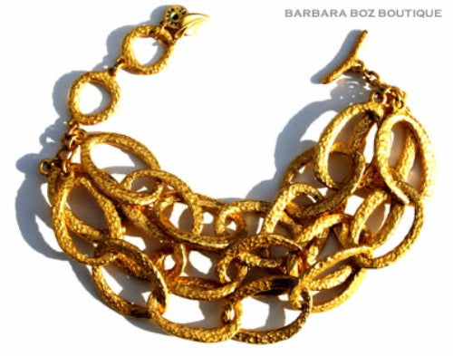 closeup of organic-shaped gold bracelet