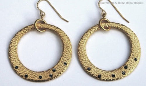 top view of organic-shaped gold earrings