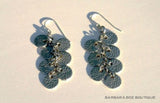 top view of organic-shaped silver earrings