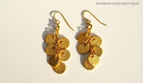 top view of organic-shaped gold earrings