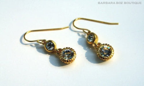 top view of organic-shaped gold earrings