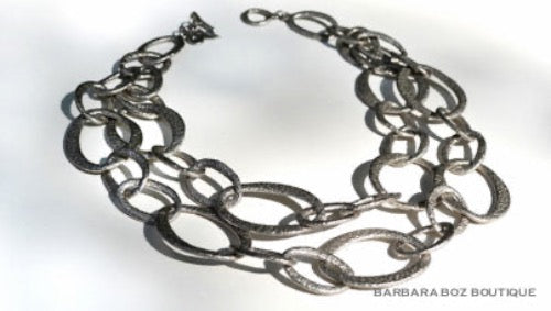 top view of organic-shaped silver necklace