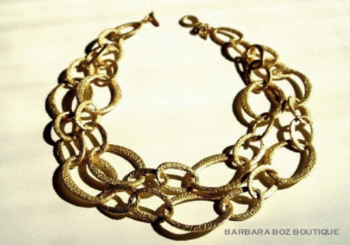 top view of organic-shaped gold necklace