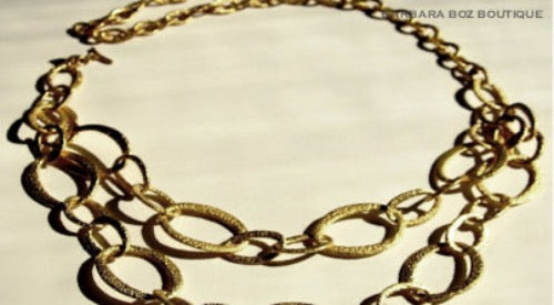 top view of organic-shaped gold necklace