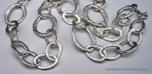 top view of organic-shaped silver necklace