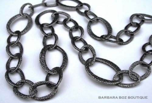 top view of organic-shaped silver necklace