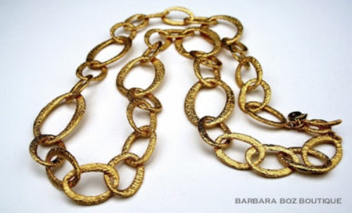 top view of organic-shaped gold necklace