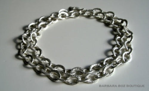 top view of organic-shaped silver necklace