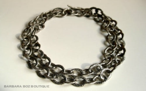 top view of organic-shaped silver necklace