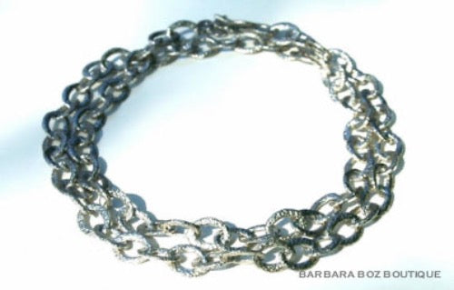 top view of organic-shaped silver necklace