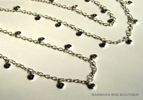 top view of organic-shaped silver necklace