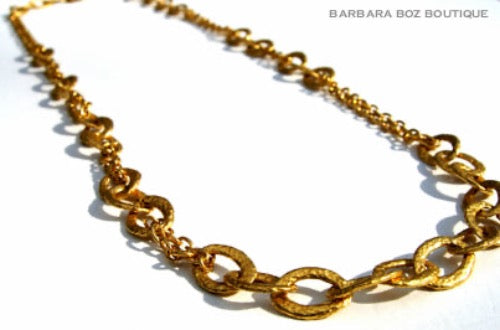 top view of organic-shaped gold necklace