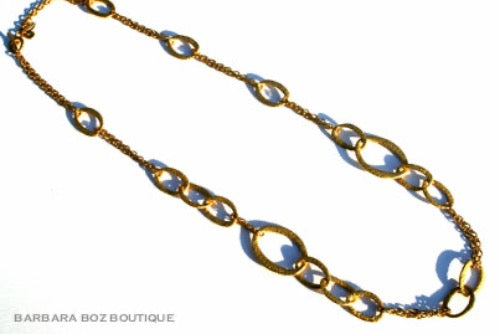 top view of organic-shaped gold necklace