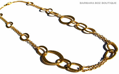 top view of organic-shaped gold necklace