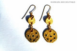 top view of organic-shaped gold earrings