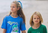 models wearing colorful heishi necklaces