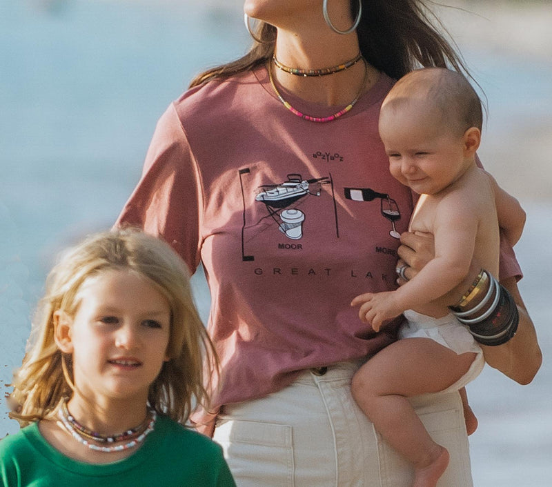 models wearing colorful heishi necklaces