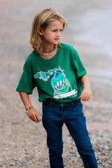 young boy wearing lake t-shirt with michigan mr. michi character