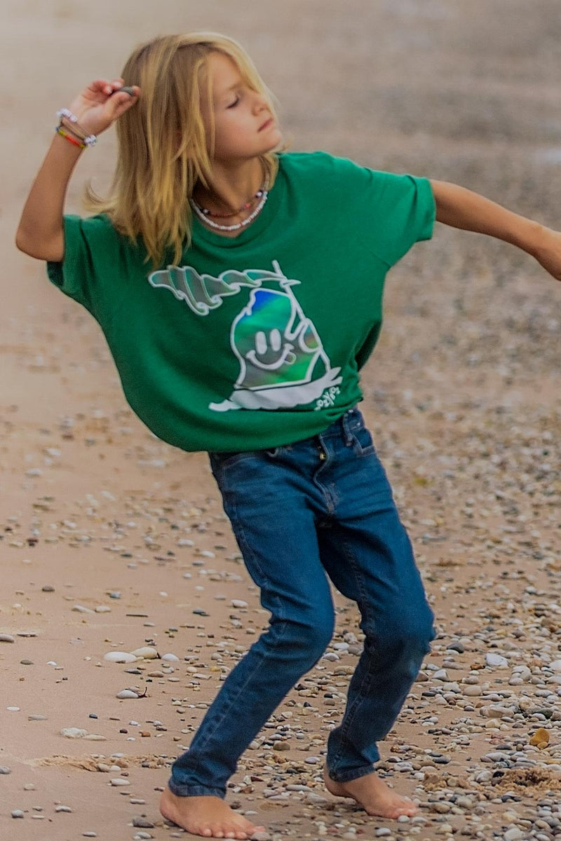 young boy wearing lake t-shirt with michigan mr. michi character