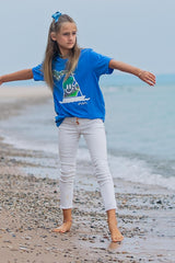 young girl wearing lake t-shirt with michigan mr. michi character