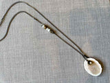 top view of antler slice necklace on silver-plate reclaimed chain