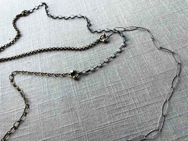 closeup of one of a kind small scale mixed metal fragment chain