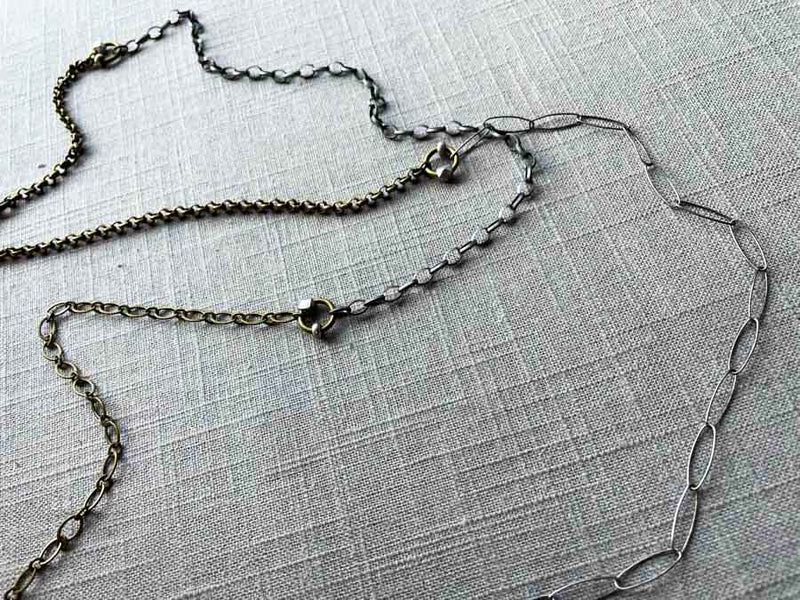 closeup of one of a kind small scale mixed metal fragment chain