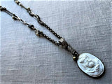 top view of antique carved cameo pendant (Hercules) on chain mix