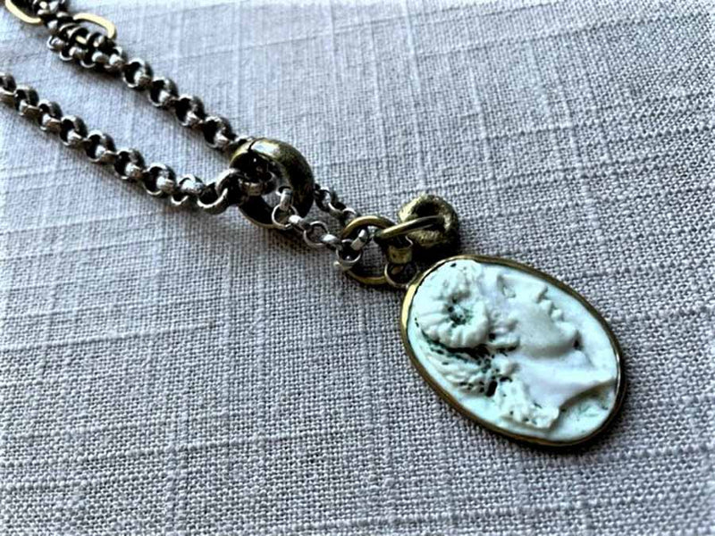 closeup of antique carved cameo pendant (Alexander the Great) on chain mix