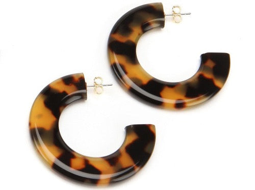 top view of resin earrings in tortoise shell