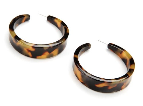 top view of resin earrings in tortoise shell