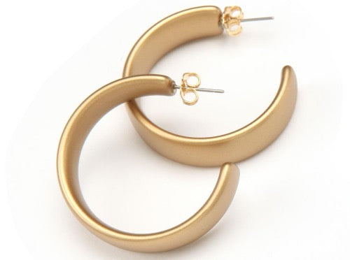 top view of resin earrings in matte gold