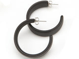 top view of resin earrings in matte black