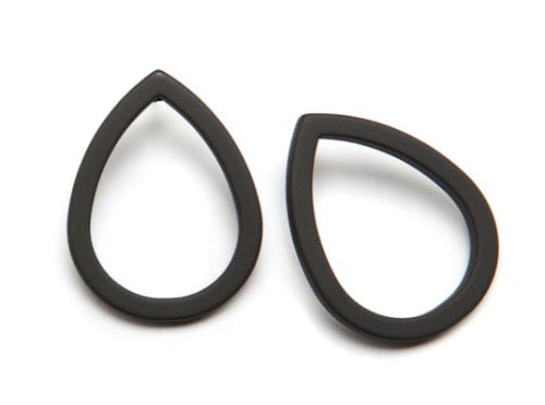 top view of resin earrings in matte black