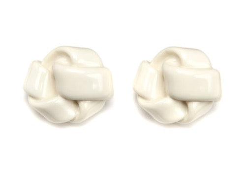 top view of resin earrings in white