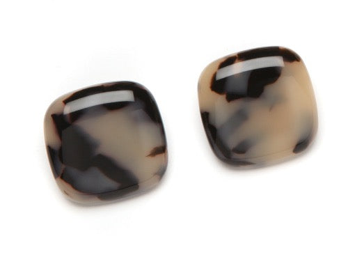 top view of resin clip earring in Havana tortoise shell