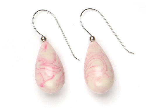 top view of resin earrings in rose