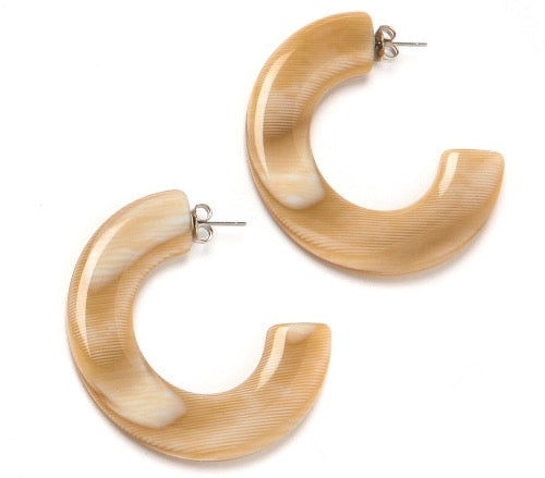 top view of resin earrings in camel