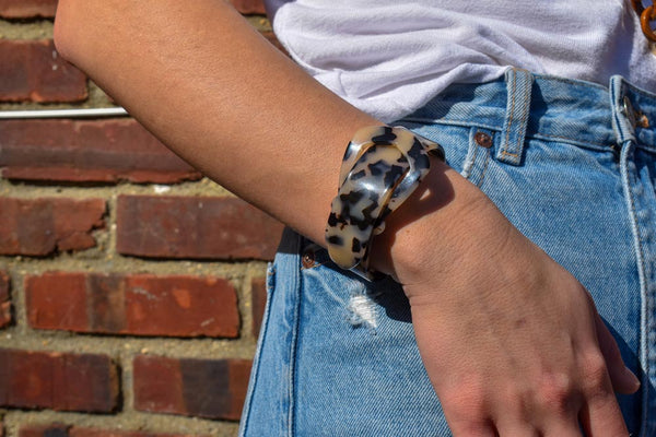 Model wearing resin bracelet in havana