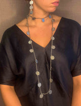 model wearing organic-shaped silver necklace